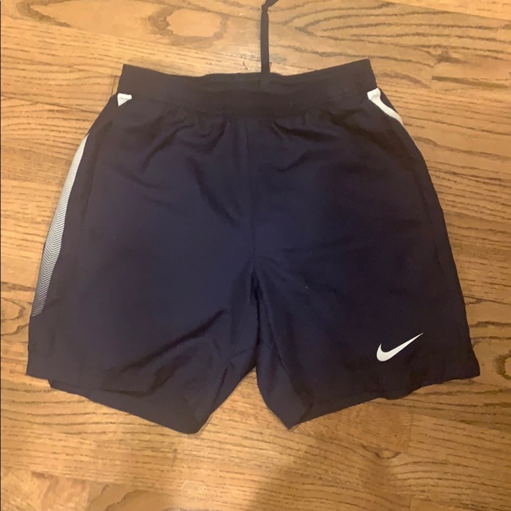 Nike tennis shorts, navy blue 7” inseam, 2 pockets